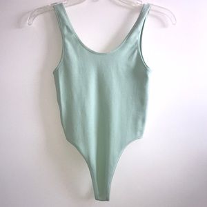 Mint green body suit